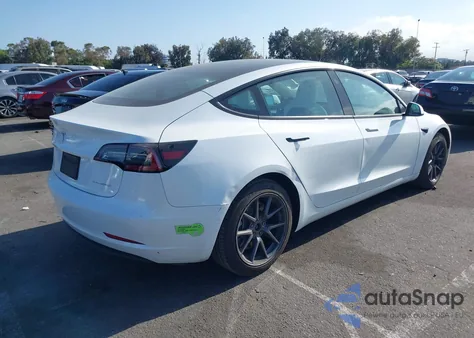2022 Tesla Model 3 из США, поврежденный, VIN 5YJ3E1EB9NF337502